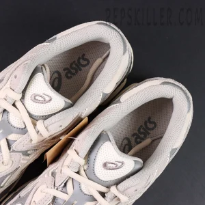 Top view of ASICS GEL-NYC “Cream Oyster Grey” insoles with visible asics branding.