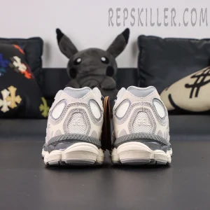 Rear view of ASICS GEL-NYC “Cream Oyster Grey” highlighting heel GEL cushioning and embroidered logo.