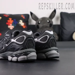 Angled back view of ASICS GEL-NYC “Graphite Grey Black” highlighting GEL midsole and panel layering.