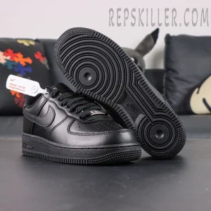 Nike Air Force 1 ’07 “Triple Black” outsole and side view showing classic circular traction pattern.