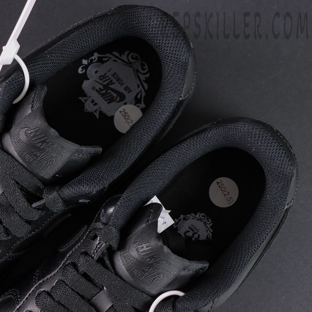Top-down view of Nike Air Force 1 ’07 “Triple Black” showing black mesh insoles and Nike Air branding.