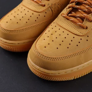 Close-up of Nike Air Force 1 Low ‘Flax’ 2019 toe box with perforated detailing and smooth stitching