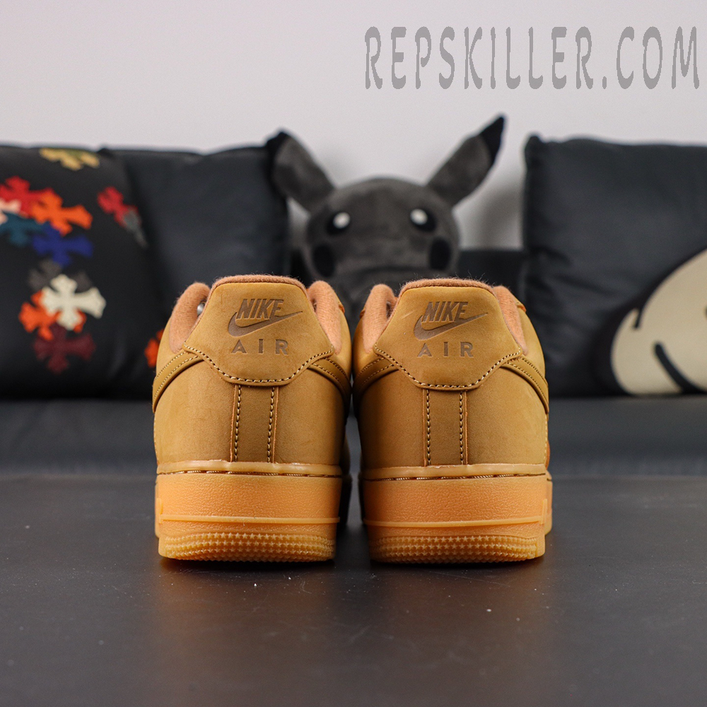 Back heel view of Nike Air Force 1 Low ‘Flax’ 2019 displaying Nike Air embossing and tonal stitching