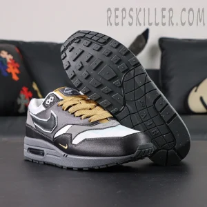 Sole view of Nike Air Max 1 “Low Poly - Big Head Mode” with black traction outsole and signature Air Max cushioning.