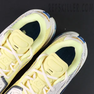 Overhead view of Nike Air Zoom GT Cut “Sabonis Playoffs PE” highlighting yellow tongue and printed insoles.