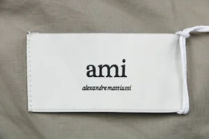 Ami Embossed Heart Pocket Shirt Brand label