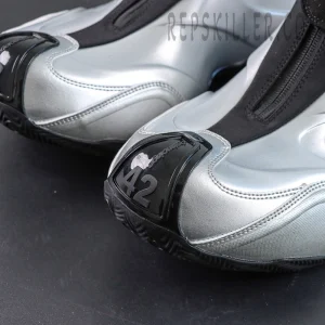 Close-up of Balenciaga Basketball Sneaker in Silver/Black toe box featuring size 42 marking and embossed branding.