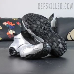 Sole view of Balenciaga Basketball Sneaker in Silver/Black highlighting herringbone traction pattern and sleek metallic body.