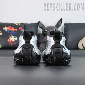 Back view of Balenciaga Basketball Sneaker in Silver/Black featuring black outsole and rear pull tab.