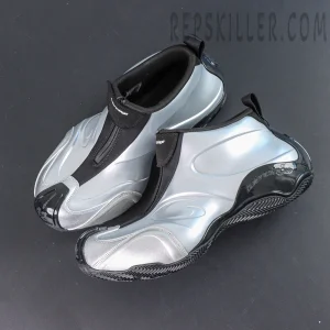 Overhead view of Balenciaga Basketball Sneaker in Silver/Black showing sleek curved panels and center zip design.