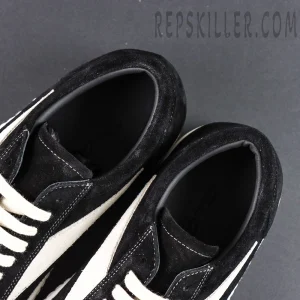 Close-up of collar area on DRKSHDW Hollywood Vintage Low “Black Milk” showing plush suede texture and inner lining.