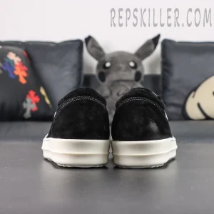 Rear view of DRKSHDW Hollywood Vintage Low “Black Milk” showing minimalist heel design and elevated sole.