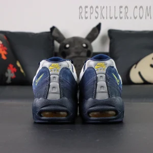 Back view of Eric Koston x Nike SB x Air Max 95 ‘Obsidian Speed Yellow’ showing heel Air units and dual logos.