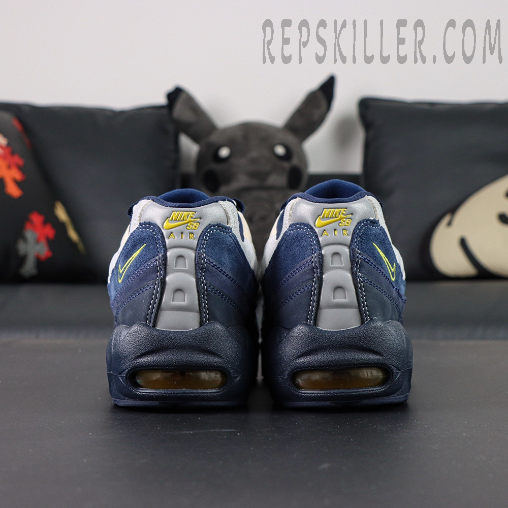 Back view of Eric Koston x Nike SB x Air Max 95 ‘Obsidian Speed Yellow’ showing heel Air units and dual logos.