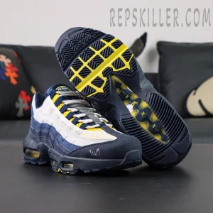 Bottom view of Eric Koston x Nike SB x Air Max 95 ‘Obsidian Speed Yellow’ showing traction pattern and SB logo.