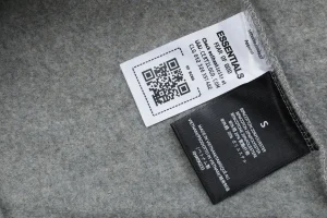 Fear of God Essentials Arc Logo Polo Sweatshirt Grey Wash label