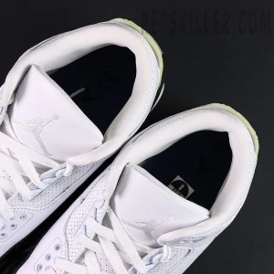 Top view of Fragment Design x Air Jordan 3 “White” showing white tongue with silver Jumpman logo.
