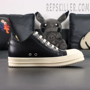 Side profile of Hollywood Low “Black Milk” featuring black leather upper with cream toe cap and sole.