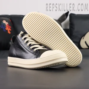 Outsole view of Hollywood Low “Black Milk” showing ribbed traction pattern and embossed branding.