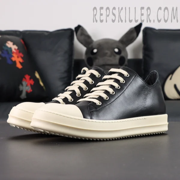 Front angled view of Hollywood Low “Black Milk” showcasing its minimalist silhouette and vintage sole.