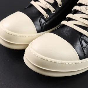 Close-up of Hollywood Low “Black Milk” toe cap highlighting cream rubber material and fine stitching.