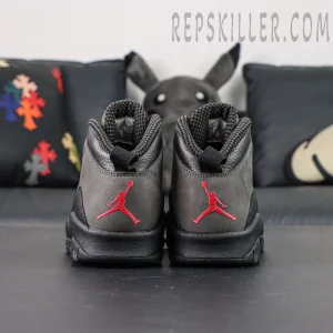 Rear view of Air Jordan 10 Retro “Shadow” with red Jumpman embroidery over grey and black upper.
