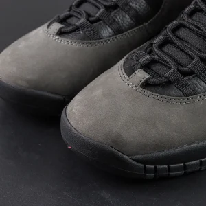 Close-up of Air Jordan 10 Retro “Shadow” toe box showing soft matte grey nubuck texture.