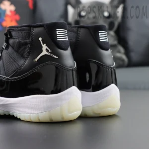 Rear angle of Air Jordan 11 “Jubilee” featuring silver Jumpman and ‘23’ heel embroidery.