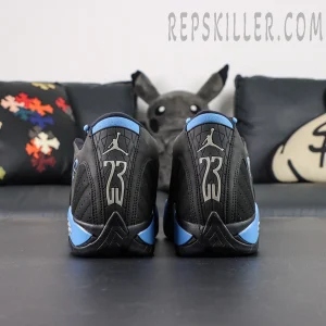 Rear heel detail of Air Jordan 14 “Black University Blue” with metallic 23 and Jumpman logo overlay.