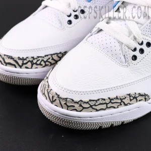 Close-up of Air Jordan 3 “UNC” toe box showing tumbled white leather and signature elephant print overlay.