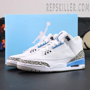 Air Jordan 3 Retro “UNC” sneakers with blue Jumpman box in background, featuring white leather upper and University Blue accents.