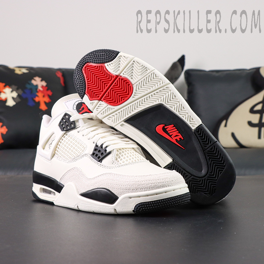 Bottom view of Air Jordan 4 Retro “Flight Club” featuring red and black outsole with Nike logo.