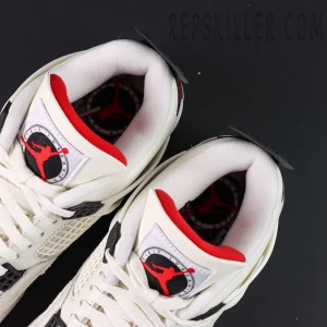 Overhead view of Air Jordan 4 Retro “Flight Club” showing Jumpman tongue logo and red interior.