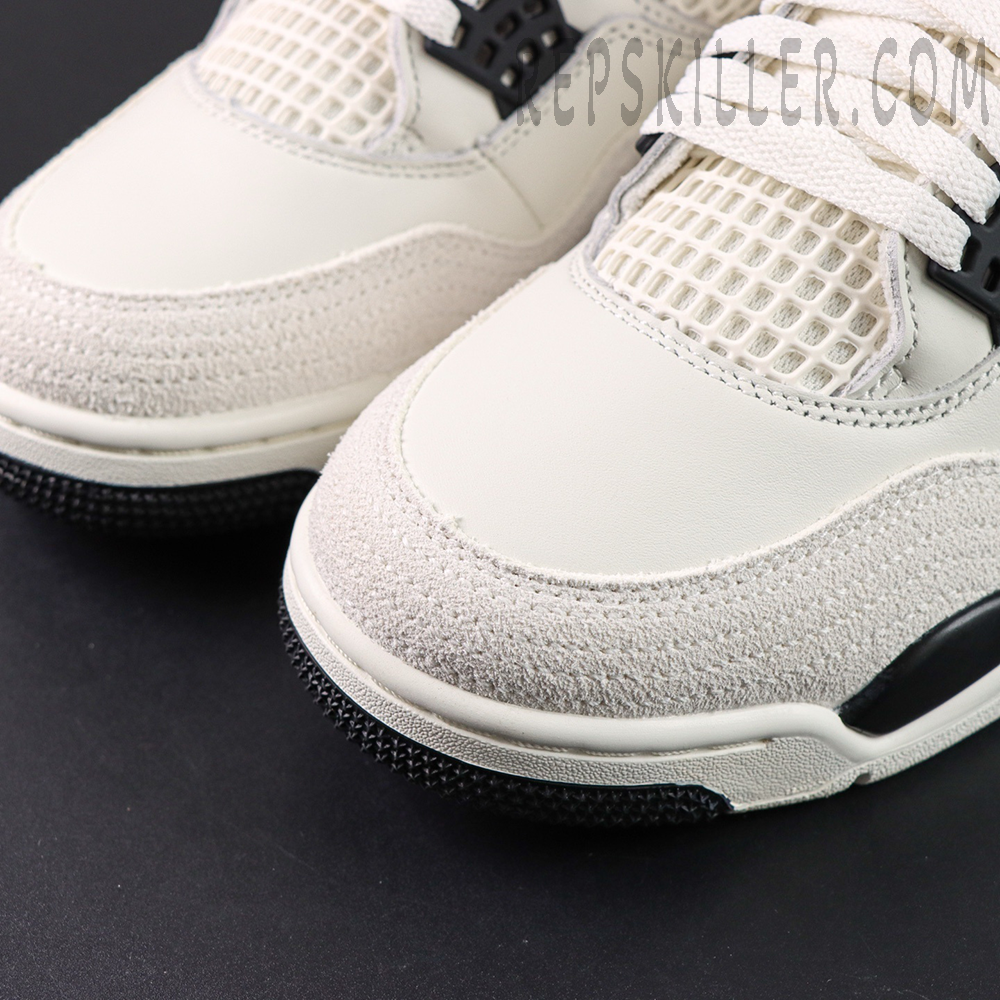 Close-up of Air Jordan 4 Retro “Flight Club” toe box showing suede and mesh materials.