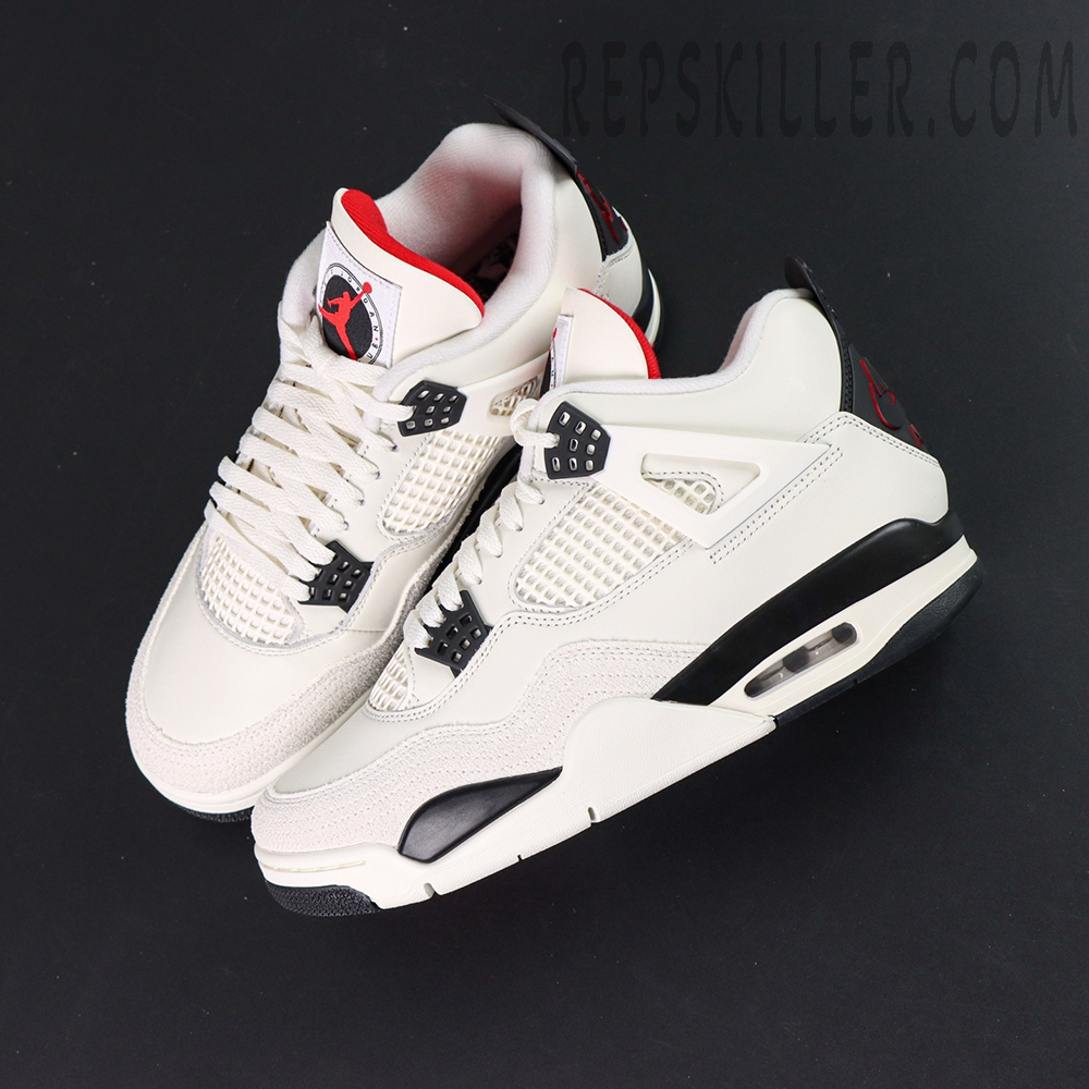 Pair shot of Air Jordan 4 Retro “Flight Club” highlighting white leather upper and black accents.