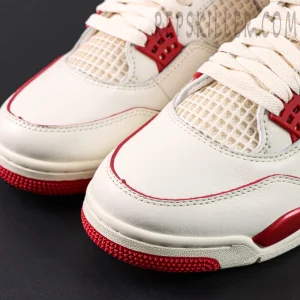 Close-up of Air Jordan 4 Retro “Sierra Red” toe box highlighting smooth leather and stitching detail.