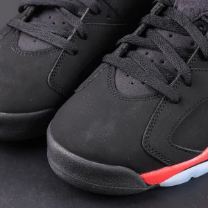 Air Jordan 6 Retro ‘Infrared’ 2019 — Close-up of the black nubuck toe box with matte finish and red midsole accent.