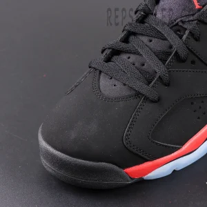 Air Jordan 6 Retro ‘Infrared’ 2019 — Close-up of black nubuck upper and lace structure with red midsole accent.