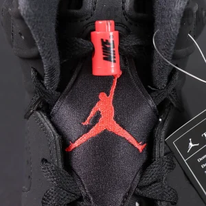Air Jordan 6 Retro ‘Infrared’ 2019 — Close-up of embroidered red Jumpman logo on black tongue.