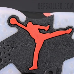 Air Jordan 6 “Reverse Infrared” — Outsole close-up with red Jumpman logo against translucent sole.