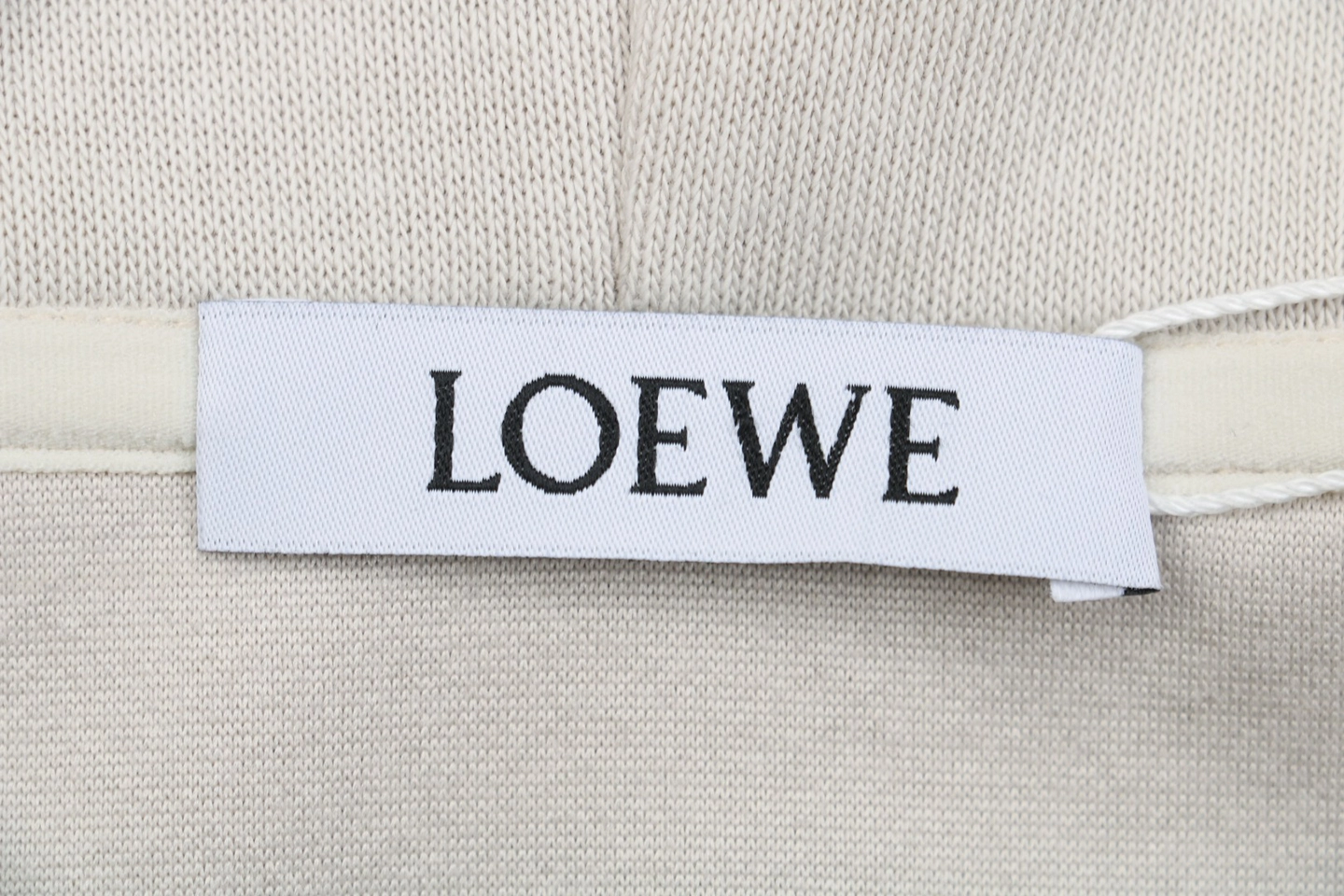 L Guinea Pig Puzzle Logo Embroidered Hoodie Beige Brand Label