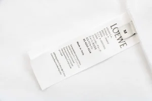 L ON Logo Embossed Shirt White Wash label