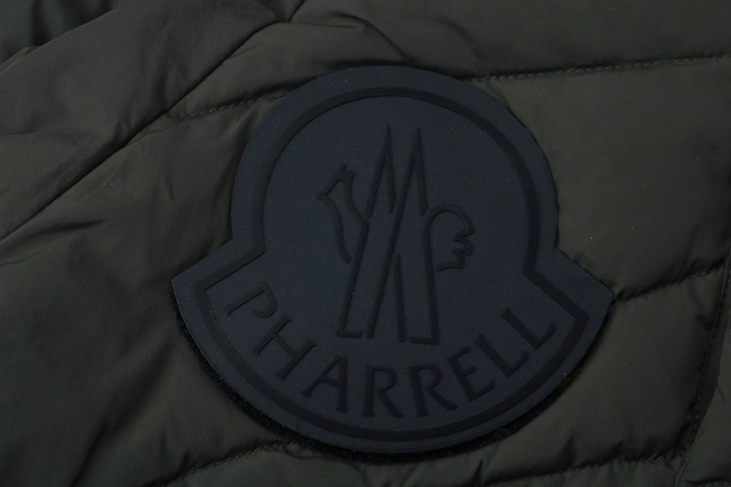 Mxxcler x Pharrell Williams Oversized Logo Puffer Jacket Brand