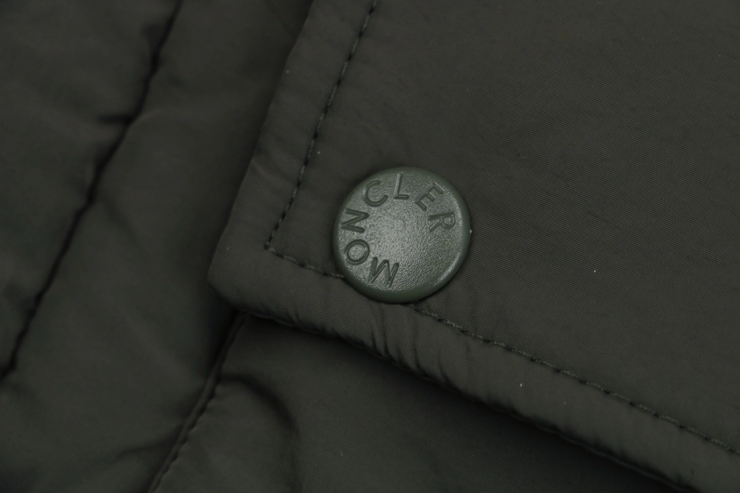 Mxxcler x Pharrell Williams Oversized Logo Puffer Jacket Button