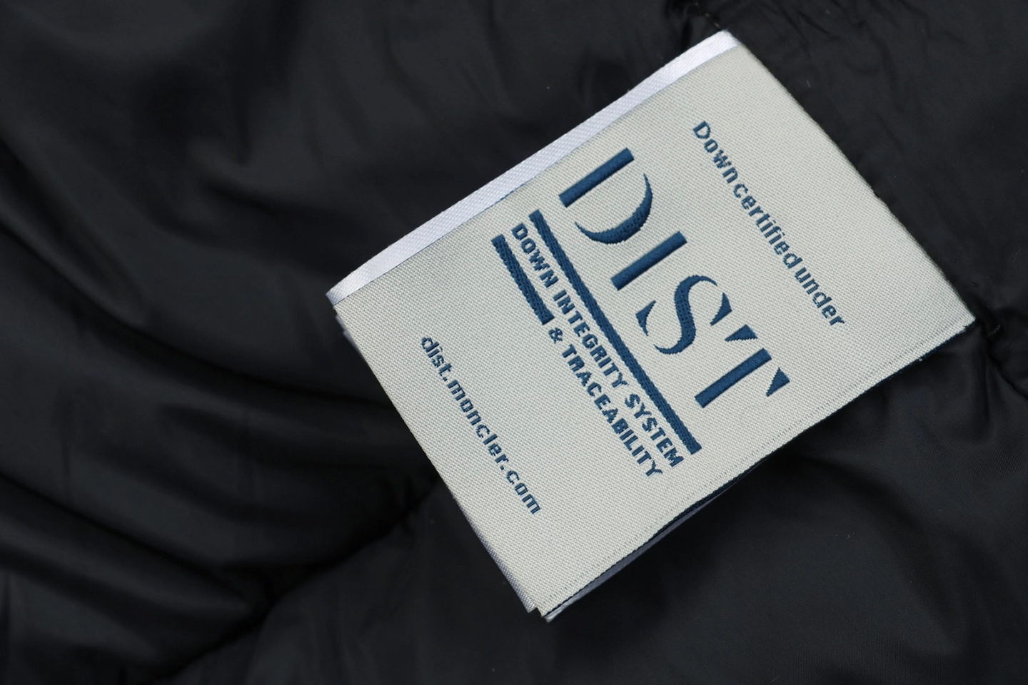 Mxxcler x Pharrell Williams Oversized Logo Puffer Jacket Wash label