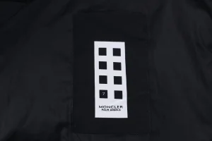 Mxxcler x Pharrell Williams Oversized Logo Puffer Jacket Wash label