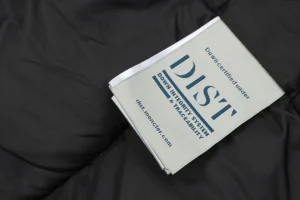 Mxxcler x Pharrell Williams Patchwork Utility Hooded Down Jacket Wash label