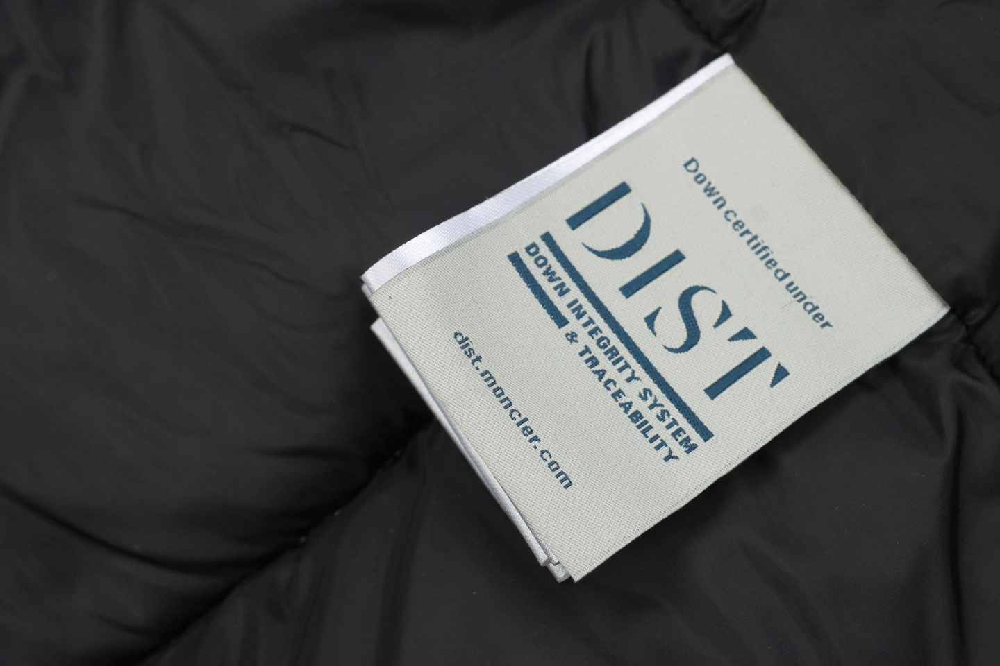 Mxxcler x Pharrell Williams Patchwork Utility Hooded Down Jacket Wash label