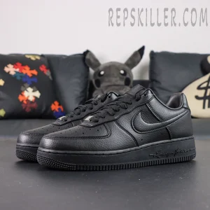 Side angle of NOCTA x Air Force 1 “Certified Lover Boy” showing clean leather upper and signature sole text “Love You Forever.”