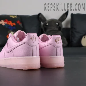 Rear angled view of NOCTA x Nike Air Force 1 “Pink Foam” showing Nike Air and trident heel logos.